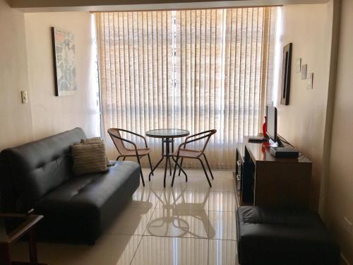 Χώρος καθιστικού στο Férias na praia de Ponta Verde