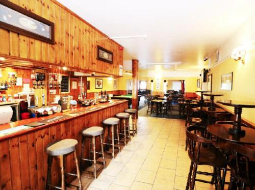 The lounge or bar area at The Pheasant Inn