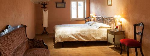Säng eller sängar i ett rum på Masia CasaJoana Rural