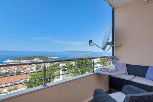a balcony with a view of the ocean at Villa Sukara in Makarska