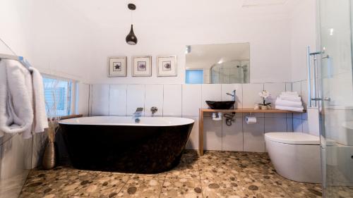Koupelna v ubytování Ulverstone River Edge HolidayApartments