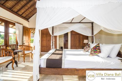 Giường trong phòng chung tại Villa Diana Bali