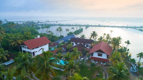 an aerial view of a resort with a body of water at Indriya Sands in Cherai Beach