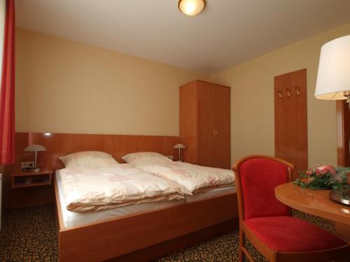 Postel nebo postele na pokoji v ubytování Hotel Matthias