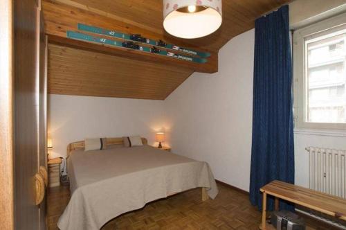 Postel nebo postele na pokoji v ubytování Crans Montana Cervin 35