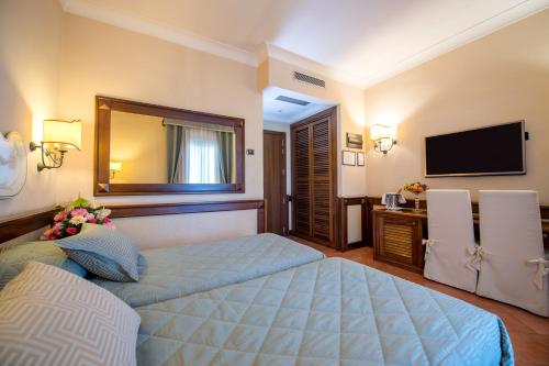 Hotel Michelangeloにあるベッド