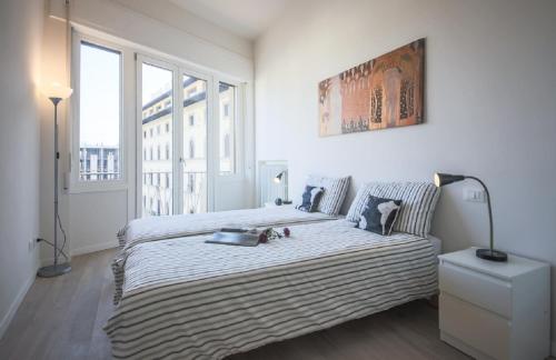 Voodi või voodid majutusasutuse Apartments Florence - Unità Balcony toas