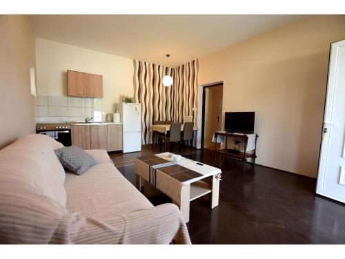 Η κουζίνα ή μικρή κουζίνα στο Apartments LaRoom