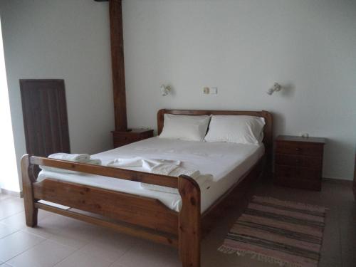 A bed or beds in a room at Ilis Villas