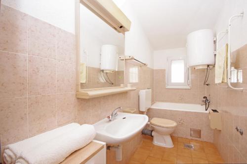 Koupelna v ubytování Apartments Bartulić