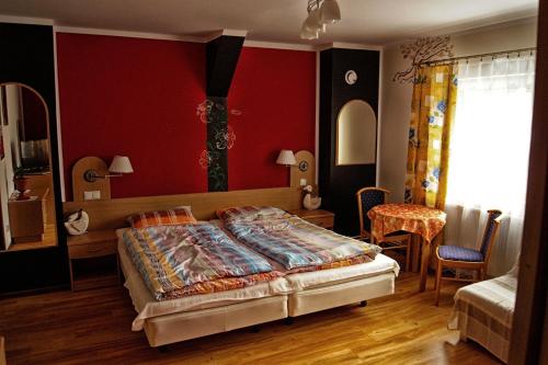 Ένα ή περισσότερα κρεβάτια σε δωμάτιο στο Finezja Wiedeńska