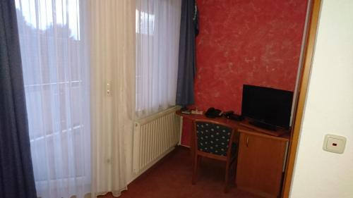 TV a/nebo společenská místnost v ubytování Hotel Kuhfelder Hof