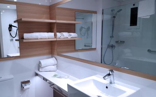Kúpeľňa v ubytovaní Hotel Cesar Augustus