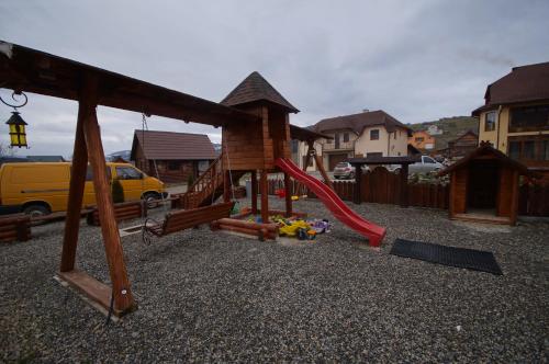 a playground with a slide at Panorama Yasinya in Yasinya
