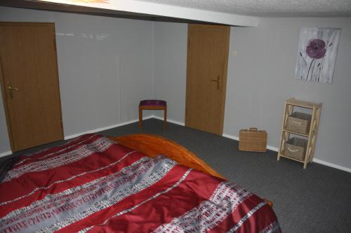 Letto o letti in una camera di Ferienwohnung beim Dünzebacher Torturm