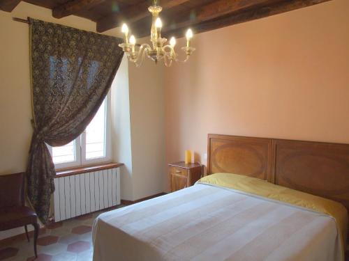 Кровать или кровати в номере Crocevia Del Sale
