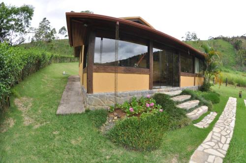 Jardín al aire libre en Pousada Solar dos Vieiras