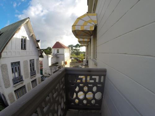
A balcony or terrace at Carib Hotel
