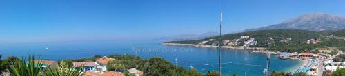 a large body of water with a town and a harbor at Apartment Carpe Diem 1 in Utjeha