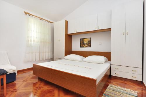 Posteľ alebo postele v izbe v ubytovaní Apartments Marija Pisak