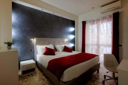 Postel nebo postele na pokoji v ubytování Rome By Suite Vatican