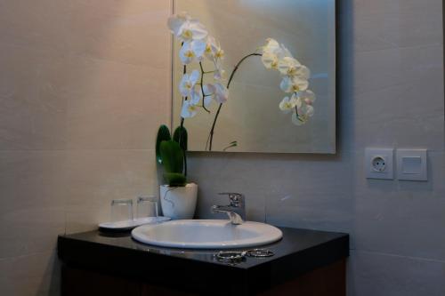 Kúpeľňa v ubytovaní Singgah Hotel Seminyak