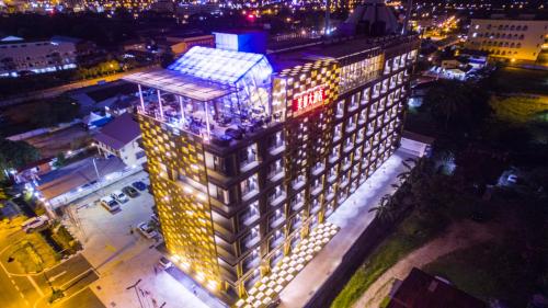an overhead view of a tall building at night at Hotel Labuan Point in Labuan