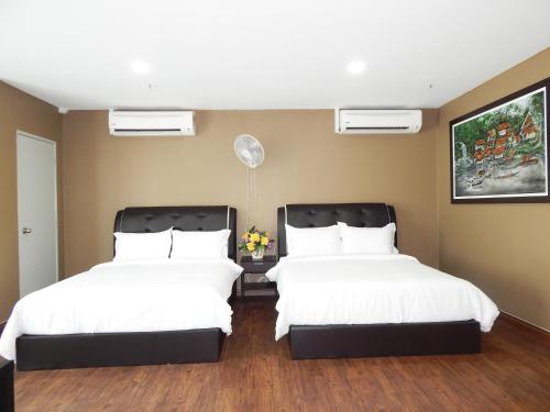 Katil atau katil-katil dalam bilik di Wadi Iman Guesthouse @ i-City