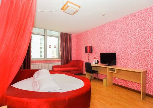 Foto de la galería de JUNYI Hotel Shandong Qingdao Huangdao District Shiyou University en Xianlang