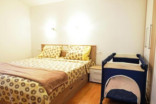 Ένα ή περισσότερα κρεβάτια σε δωμάτιο στο Villa Wind