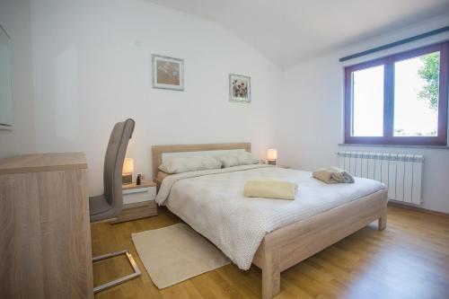 Postel nebo postele na pokoji v ubytování Koseto Tar