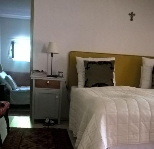 Postel nebo postele na pokoji v ubytování Maison Cirmi