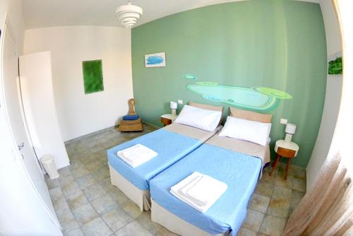 a bedroom with a bed and a bath tub at Bed & Breakfast Il Vicolo in San Benedetto del Tronto
