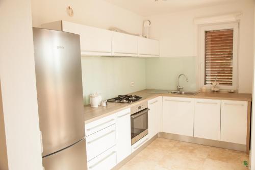 Dapur atau dapur kecil di Apartment in Villa, near Piran