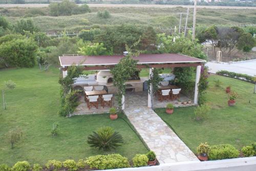 an aerial view of a gazebo in a yard at Ammos Residence in Minia