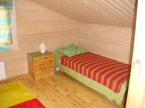 Ліжко або ліжка в номері Hauklapintie Holiday Home