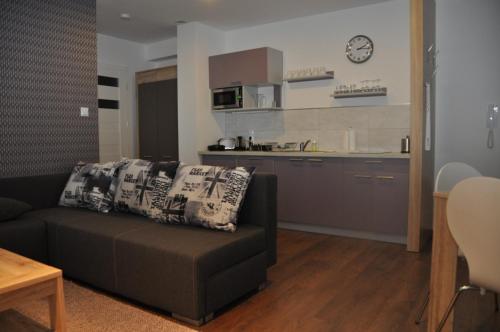 Kuchyň nebo kuchyňský kout v ubytování Apartamenty Przy Starówce