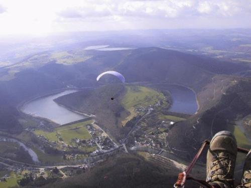 a view of a body of water from an airplane at Hotel Val De La Cascade in Stavelot