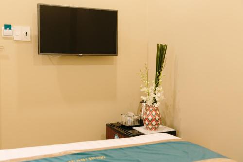 TV a/nebo společenská místnost v ubytování Minh Nhung Hotel