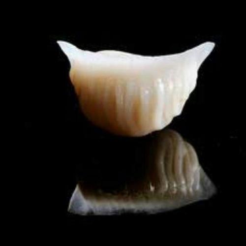 a banana cut in half on a black background at Utse Suites in Bengaluru