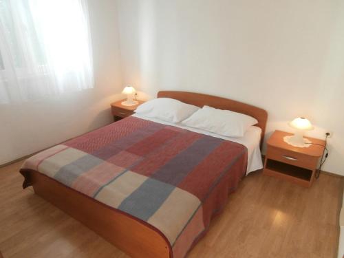 Llit o llits en una habitació de Apartments Nada