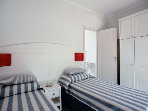 Una cama o camas en una habitación de Le Ruve Bianche