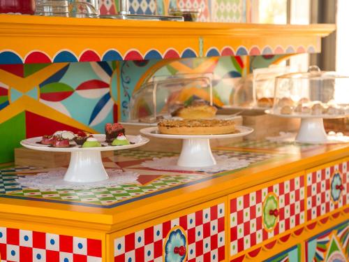 a buffet with several plates of food on it at Tra Le Braccia di Morfeo in Terrasini