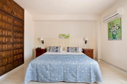 Postel nebo postele na pokoji v ubytování Hotel Las Truchas