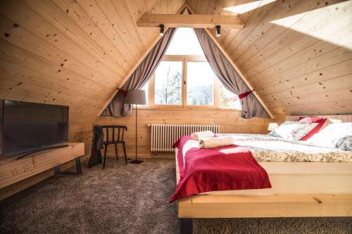 Posteľ alebo postele v izbe v ubytovaní Osada domków TATRA-DREAM