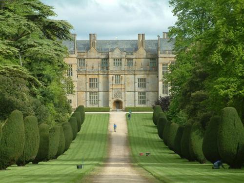 an old mansion with a pathway in front of it at Montacute Country Tearoooms in Montacute