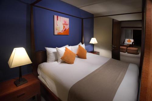 Postel nebo postele na pokoji v ubytování Secret Paradise