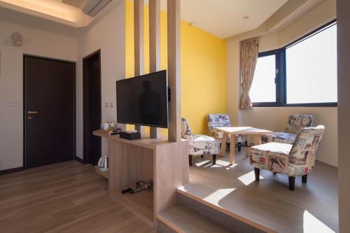 TV a/nebo společenská místnost v ubytování So Lohas B&B
