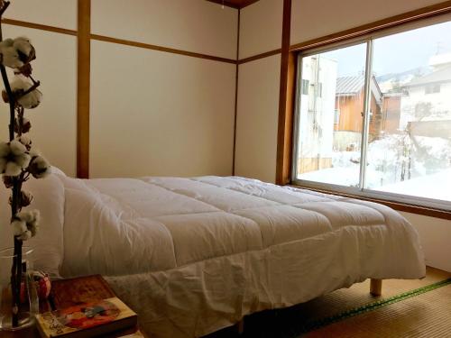 Кровать или кровати в номере Hai Lodge
