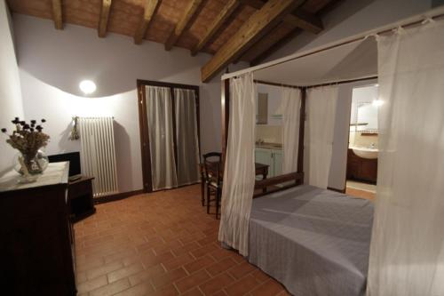Postel nebo postele na pokoji v ubytování Corte Stellata Holiday Apartments